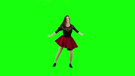 Junge-Frau-Tanzt-Auf-Einem-Grünen-Hintergrund