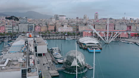 Scenic-aerial-over-Genoa-Old-Port-,-view-of-Biosfera-and-Bigo