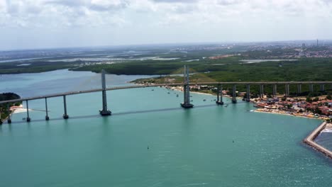 Rotating-aerial-shot-of-The-Newton-Navarro-Bridge,-one-of-the-biggest-cable-stayed-bridges-in-Brazil