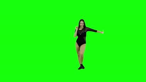 Attraktive-Und-Energiegeladene-Tänzerin-Tanzt-Vor-Einem-Grünen-Bildschirm