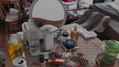 Messy-cluttered-table-in-disorganized-girl’s-bedroom