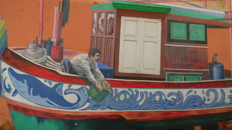 Fischer-Fängt-Fische-Auf-Dem-Boot,-Wandkunst-In-Thailand