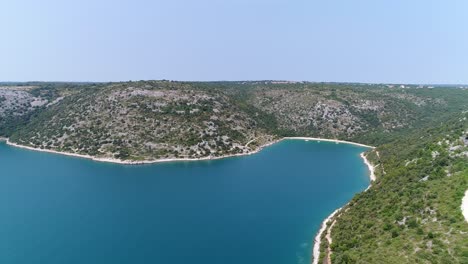 Pula-Sea-in-Croatia,-Rakalj-Aerial-Panoramic-Drone-View-of-Bay-in-European-Beach-Coastline,-Summertime-Vibes,-Clear-Daylight