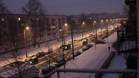 Snowy-city-streets-of-Riga,-Latvia-during-Winter-Snowstorm-Blizzard-at-Night