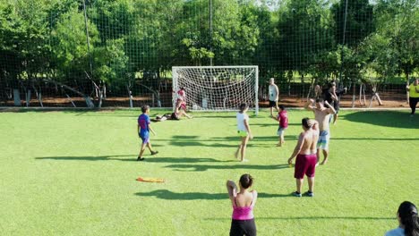 Penalty-Kick-At-Goal-From-Girl-At-Summer-House,-Paraguay