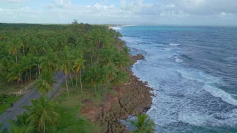 Aerial-View-Over-Tropical-Beach-Of-Nagua-In-Dominican-Republic---drone-shot