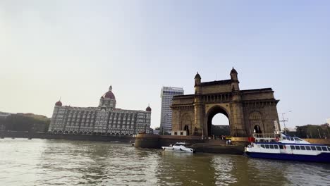 A-shot-that-captures-both-the-magnificent-structures-the-Taj-hotel-and-Gate-way-of-India-that-pull-a-large-number-of-tourist-to-Mumbai