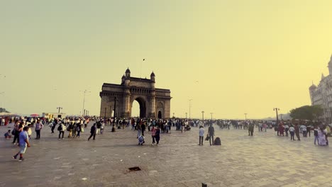 An-establishment-shot-of-the-Gate-way-of-India-which-is-filled-with-tourist-in-Mumbai