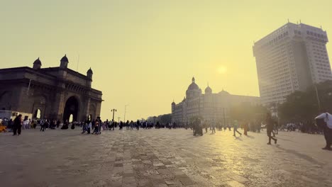 A-wide-shot-of-a-famous-tourist-spot-in-Mumbai-where-we-can-see-a-lot-of-people-going-around-the-Gate-Way-of-India