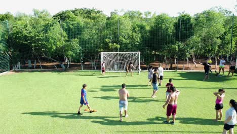 Penalty-Kick-From-Girl-At-Summer-House,-Paraguay