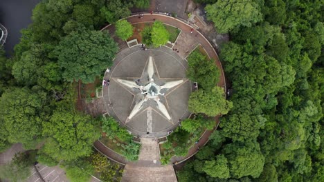 Overhead-Shot-Of-Victory-Peace-Statue-On-Top-Of-Hill,-Paraguay