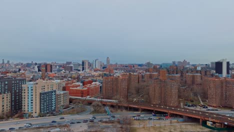 Descending-shot-of-Harlem-New-York-City,-4K-drone,-day
