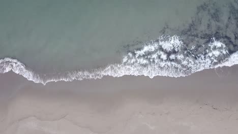 Drone-on-the-seashore-in-Forte-dei-Marmi,-Tuscany,-Italy