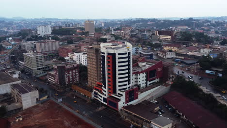 Aerial-view-in-front-of-the-General-Delegation-Of-Taxes-building,-in-cloudy-Yaounde,-Cameroon,-Africa