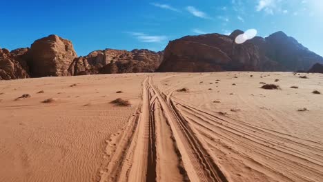 driving-on-the-desert-sand