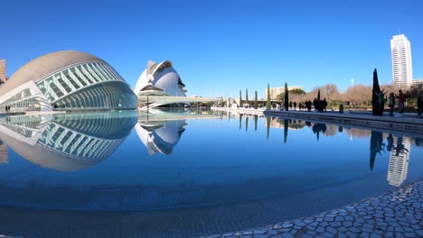 Time-lapse-view-of-people-silhouettes-at-the-City-of-Arts-and-Sciences,-designed-by-Spanish-architect-Santiago-Calatrava---Valencia,-Spain