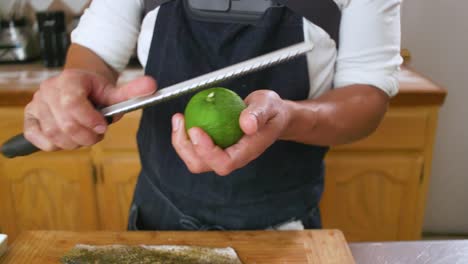 Chef-Adding-Limon-Zest-Onto-Fish