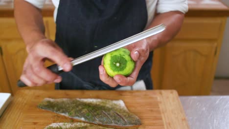 Chef-Adding-More-Limon-Zest-Onto-Fish