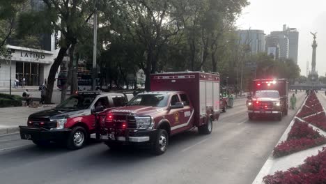 shot-of-fire-trucks-from-Mexico-City-parading-through-the-main-avenue-of-the-city