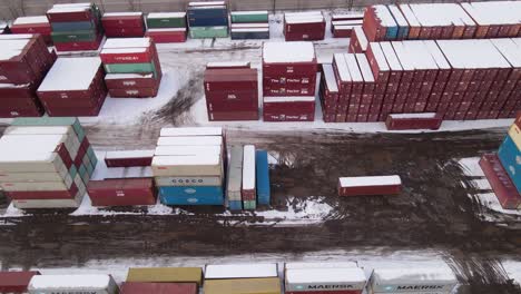 Snow-covered-shipping-containers-in-Detroit,-aerial-view