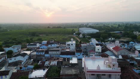 Early-Morning-drone-shot-of-a-small-Village,-old-and-new-houses,-Drone-flying-back,-Gujrat-village,-rural-development