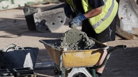Construction-worker-makes-cement-mix