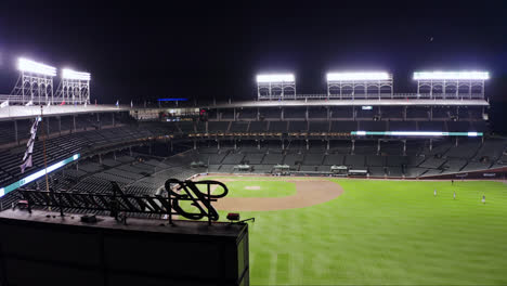 Cinematic-Establishing-Shot-of-Wrigley-Field-at-Night-from-Behind-the-Scoreboard