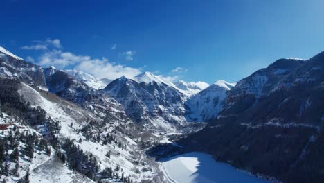 Drone-aerial-view-of-Black-Bear-Pass-in-Telluride,-Colorado-on-a-sunny-day