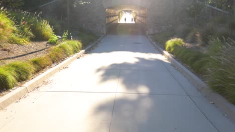 People-Walking-Through-Jeffrey-Open-Space-Trail-Tunnel