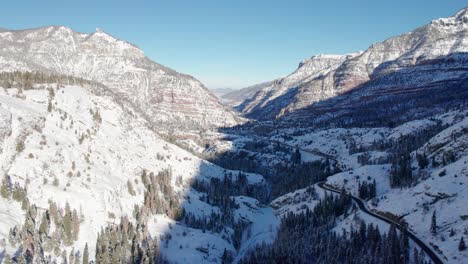Drone-aerial-views-of-Million-Dollar-Highway-in,-Colorado-during-the-winter