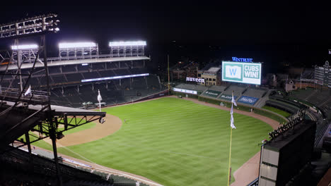 Drone-Flies-Away-from-Wrigley-Field-after-Chicago-Cubs-Win-at-Night