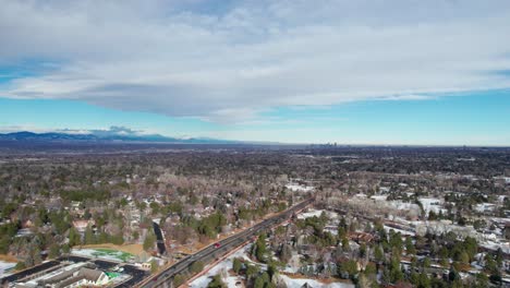 Drone-aerial-view-of-Denver,-Colorado-suburb,-Greenwood-Village-with-skyline