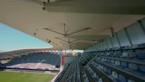 FPV-Antenne-über-Den-Sitzen-Des-Stadions-In-Montpellier,-Frankreich
