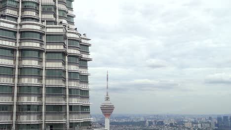 Menara-Berkembar-Petronas-Kuala-Lumpur-Malaysia-and-backgrounds-KL-Tower-tilt-shot