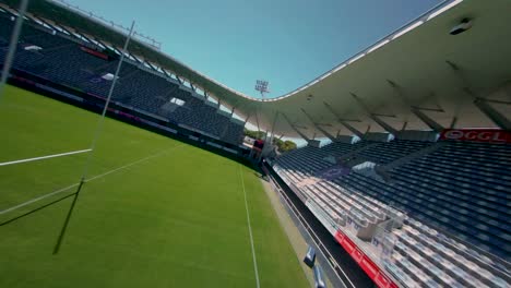FPV-aerial:-circeling-aroung-the-empty-football-stadium-in-Montpellier,-France