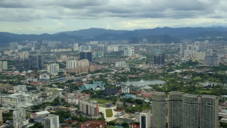 View-from-Menara-Berkembar-Petronas-Kuala-Lumpur-to-National-Museum-Hop-on-Hop-Off-Tasik-Titiwangsa-lake-tilt-shot