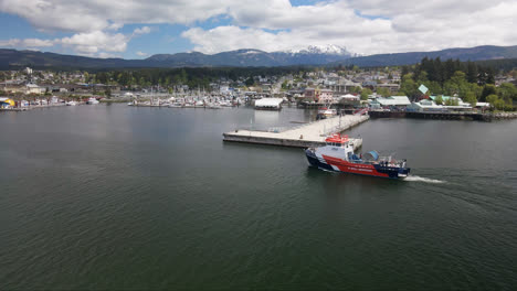 Skimming-Vessel-Patrolling-Across-The-Waters-Of-Port-Alberni-In-British-Columbia,-Canada