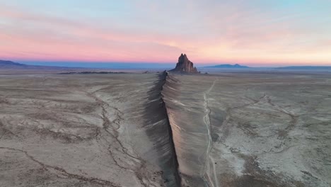 Ship-Rock-Landform-In-New-Mexico-At-Sunset---drone-shot