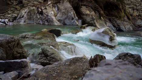 River-flowing-in-a-canyon-in-Slovenia-in-wintertime