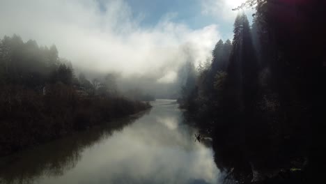 Foggy-river-in-the-morning-with-low-clouds