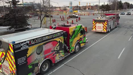 Side-view-of-firetrucks-with-special-black-history-month-artwork