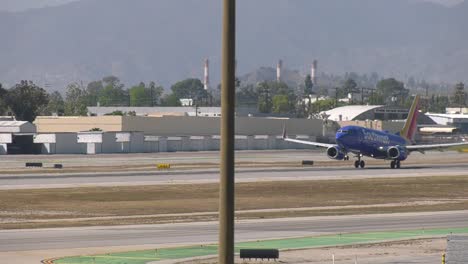 Southwest-Airplane-Takes-off-from-runway