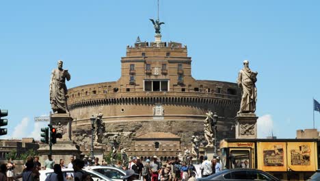 Tourists-visiting-Castel-Sant'Angelo-and-the-Sant'Angelo-Bridge-over-the-River-Tiber