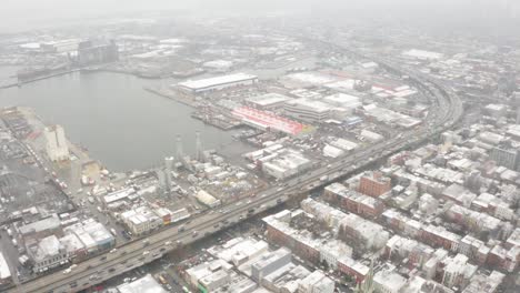 Brooklyn-Queens-Expressway-pan-up-in-the-Winter-storm-Aerial-4k