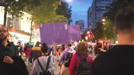 Murcia-Spain---March-8-2023:-Women's-Day-demonstration,-parade-at-Gran-Via-street-in-Murcia-city-where-lots-of-women-ask-for-equality,-freedom-and-human-rights