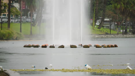 A-Close-Up-of-the-Echo-Park-Lake-Fountain-in-Heavy-Rain