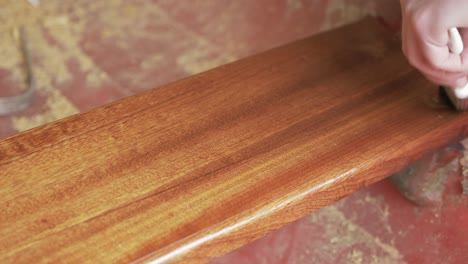 Apply-thinned-coat-of-Danish-oil-to-Sapele-plank