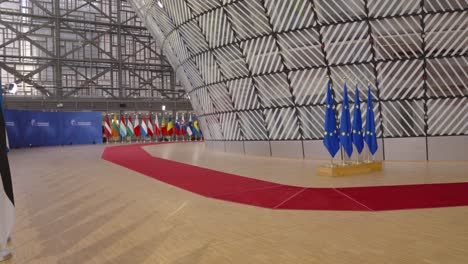 European-flags-and-country-member-state-flags-inside-the-EU-council-building-Brussels,-Belgium