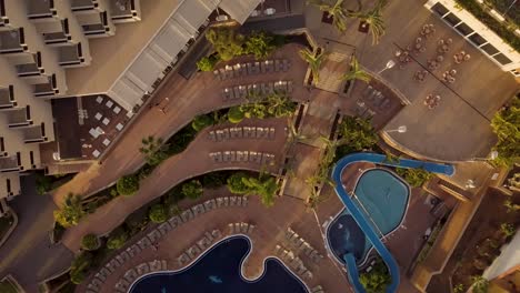 aerial-top-down-of-luxury-hotel-resort-with-swimming-pool-and-private-room-to-rent-in-tenerife-island-spain