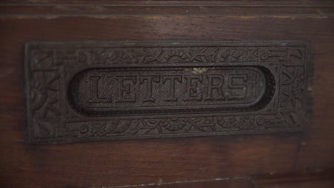 Church-Pew-Closeup---Letters-Sign-on-Back-of-Seat